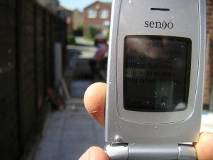flip phone in hand