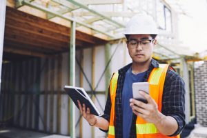 Construction worker on phone