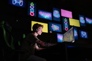 person playing games on computer